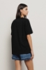 T shirt paricollo • Nero