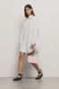 Camicia over con manica a kimono e ricamo • Bianco