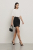 Abito corto all-in-one in cady e modal • Nero bianco