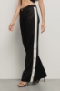 Pantalone a palazzo in twill con fianchi in raso • Nero gesso