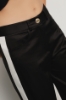 Pantalone a palazzo in twill con fianchi in raso • Nero gesso