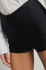 Hot pants a vita alta in lycra con strass • Nero