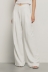 Pantalone a vita alta con riprese in cady • Gesso