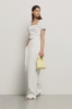 Pantalone a vita alta con riprese in cady • Gesso