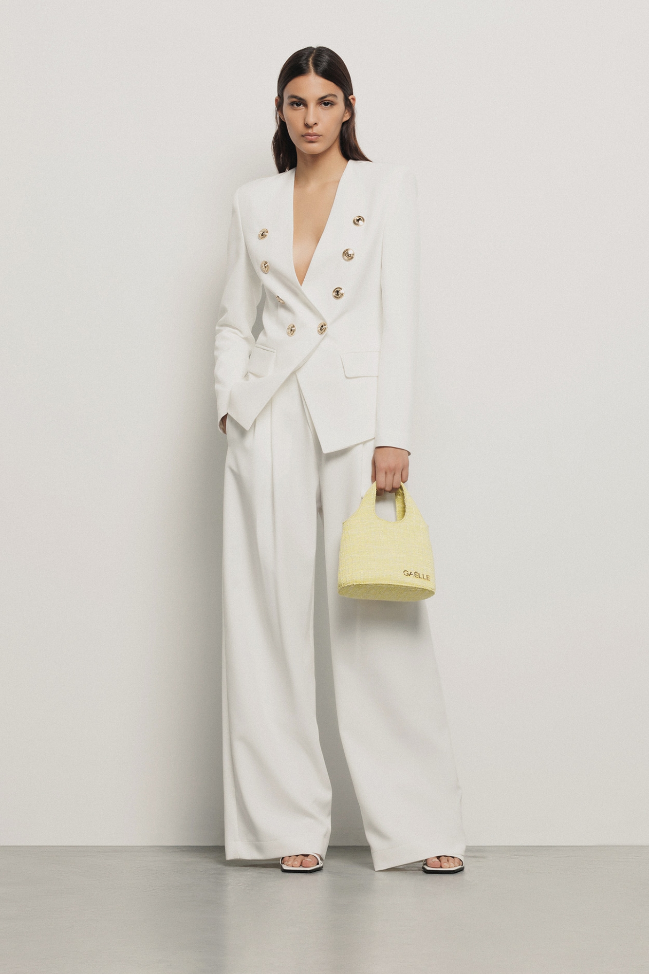 Mini hobo bag con logo in metallo • Giallo
