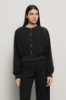 Giubbino zip con dettaglio tulle • Nero