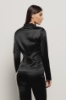 Felpa zip attillata con tasca su braccio con dettaglio tira zip • Nero