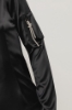 Felpa zip attillata con tasca su braccio con dettaglio tira zip • Nero