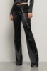 Pantalone a trombetta con vita bassa con dettaglio accessorio • Nero