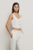 Top crop smanicato con bottoni in cady • Gesso