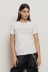 T-shirt paricollo con logo in strass+borchie • Bianco