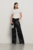T-shirt paricollo con logo in strass+borchie • Bianco