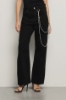 Pantalone boy over loose fit con catene strass • Nero
