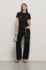 Pantalone boy over loose fit con catene strass • Nero