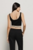 Top cropped in maglia rasata • Nero