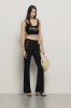 Top cropped in maglia rasata • Nero