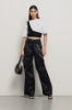 T-shirt crop con dettaglio monospalla • Bianco