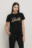 T-shirt paricollo con ricamo • Nero
