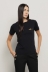 T-shirt paricollo in bielastico con logo oro lato cuore • Nero