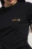 T-shirt paricollo in bielastico con logo oro lato cuore • Nero