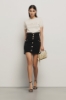 Gonna con corpetto in denim • Nero