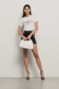 Short a vita alta in twill e raso con bottoni • Nero gesso