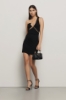 Abito corto cut out in punto milano • Nero