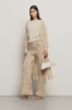 Cardigan lungo in maglia lurex • Deserto