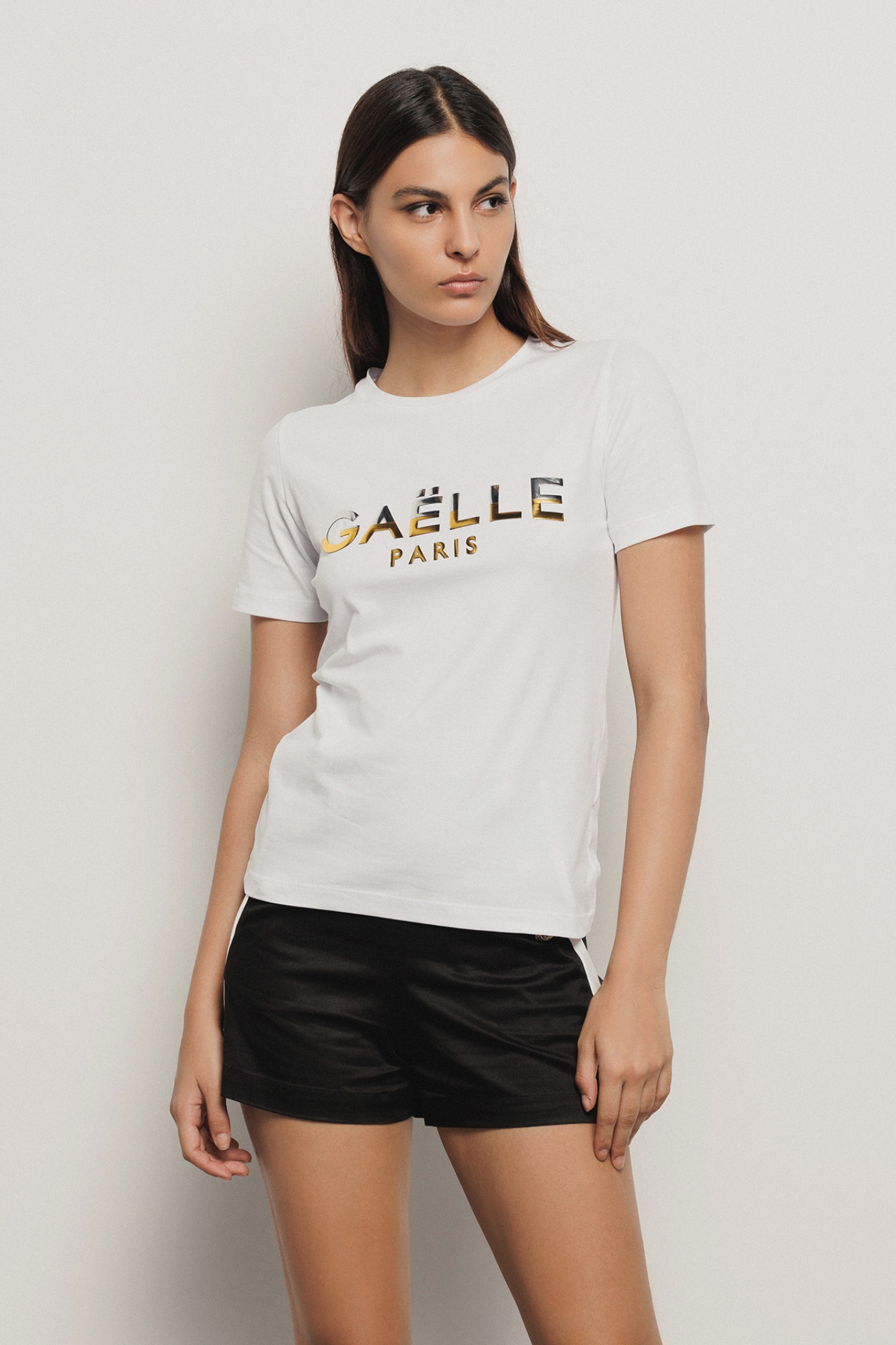 T-shirt paricollo con appl. brick oro/argento • Bianco