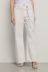 Pantalone boy over loose fit con catene strass • Off white