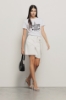 Short over loose fit con catene strass • Off white