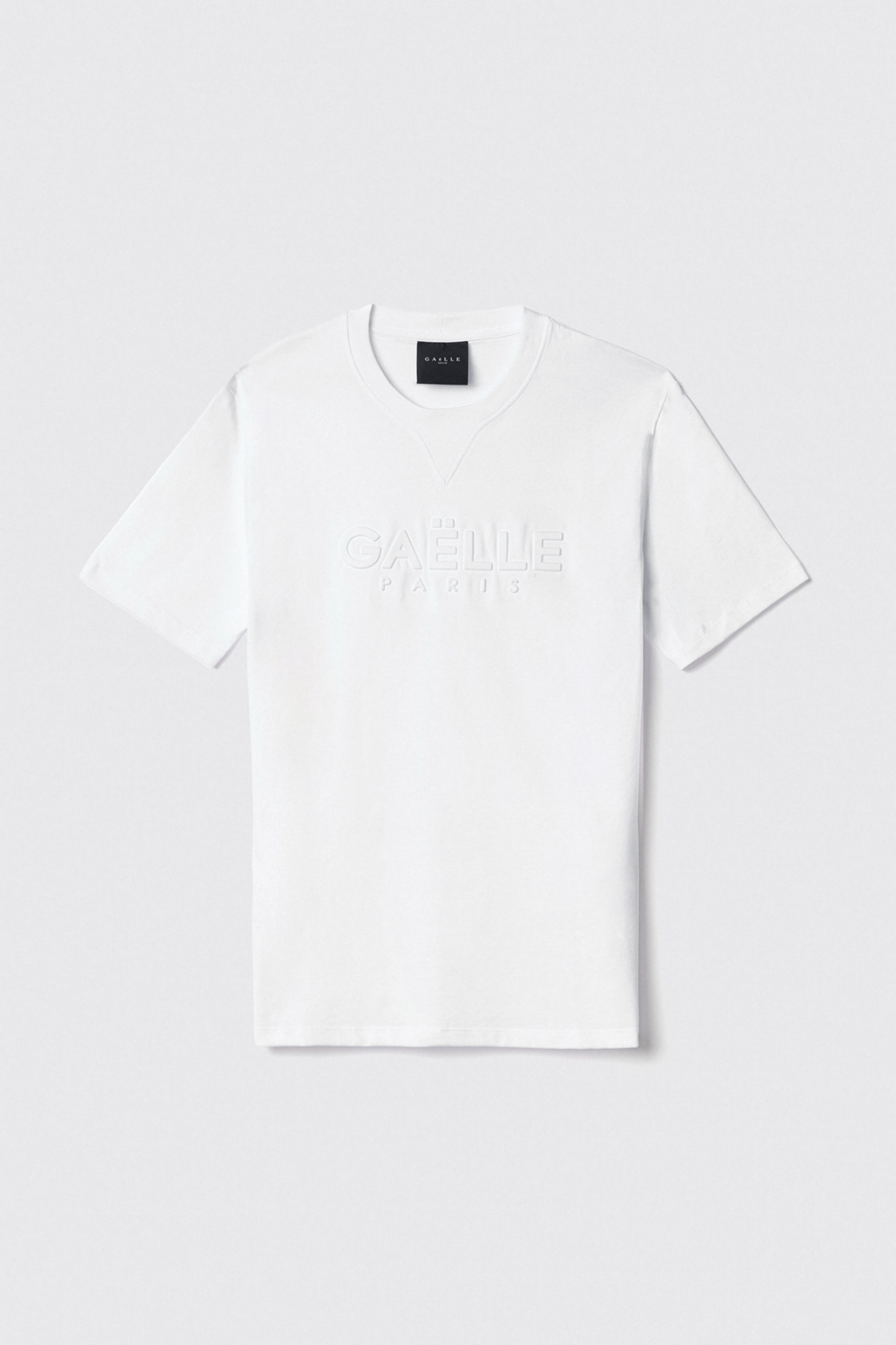 T-shirt in jersey girocollo con applicazione embossing • Bianco