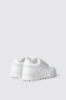 Sneakers skaters in action leather con logo embossed • Bianco