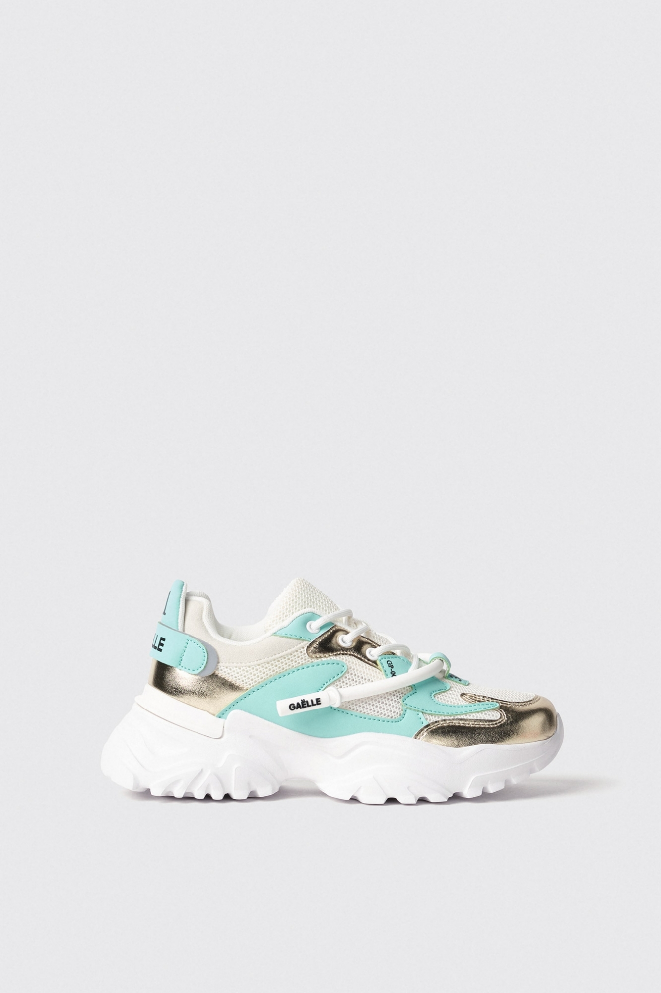 Sneakers runner in mesh con stopper logato in rubber e inserti in laminato • Verde menta