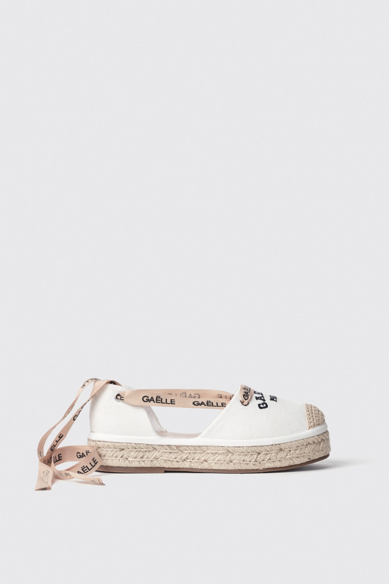 Espadrillas bassa in canvas con ricamo e gros stampato • Bianco