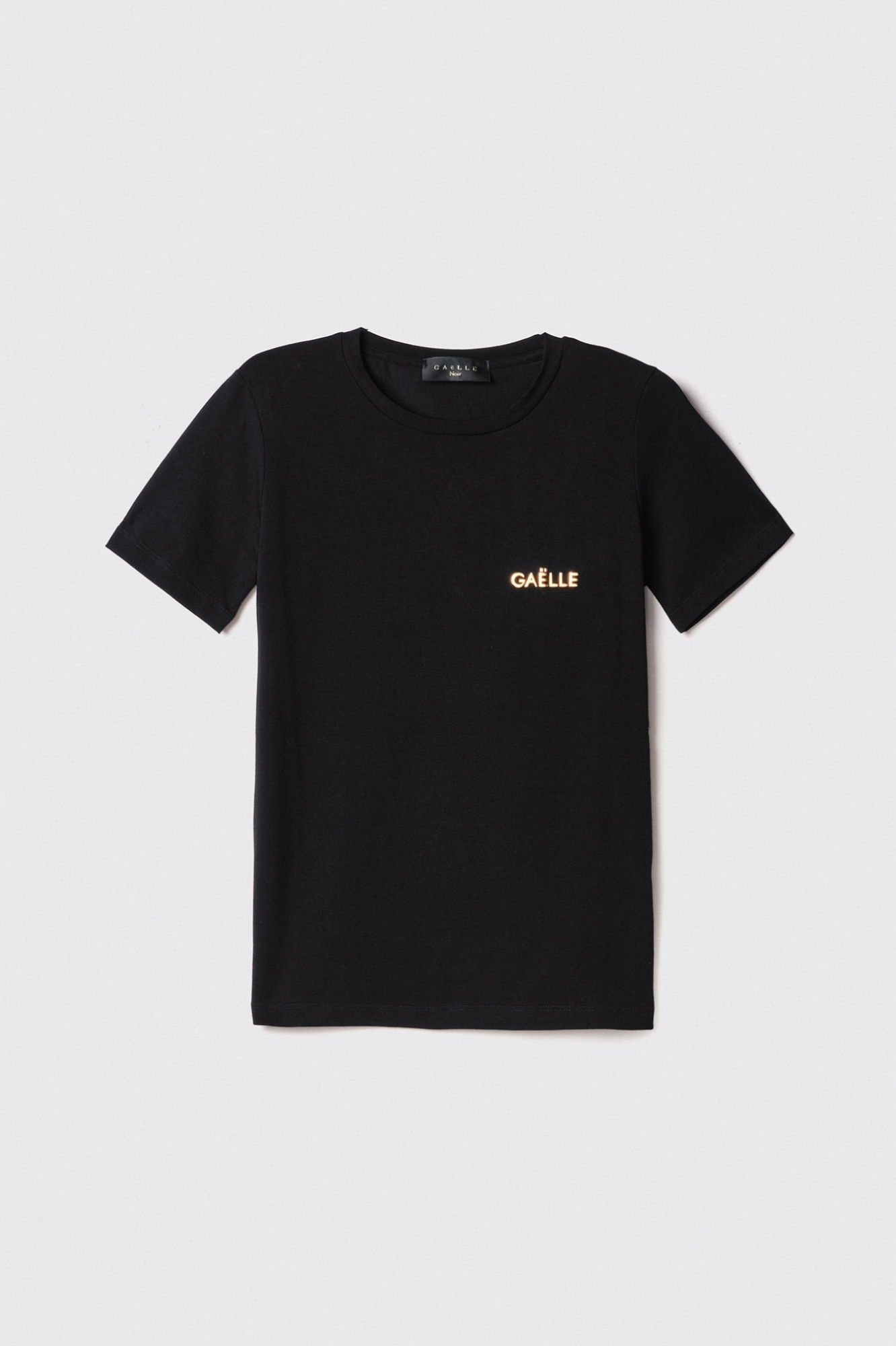 T-shirt paricollo in bielastico con logo oro lato cuore • Nero