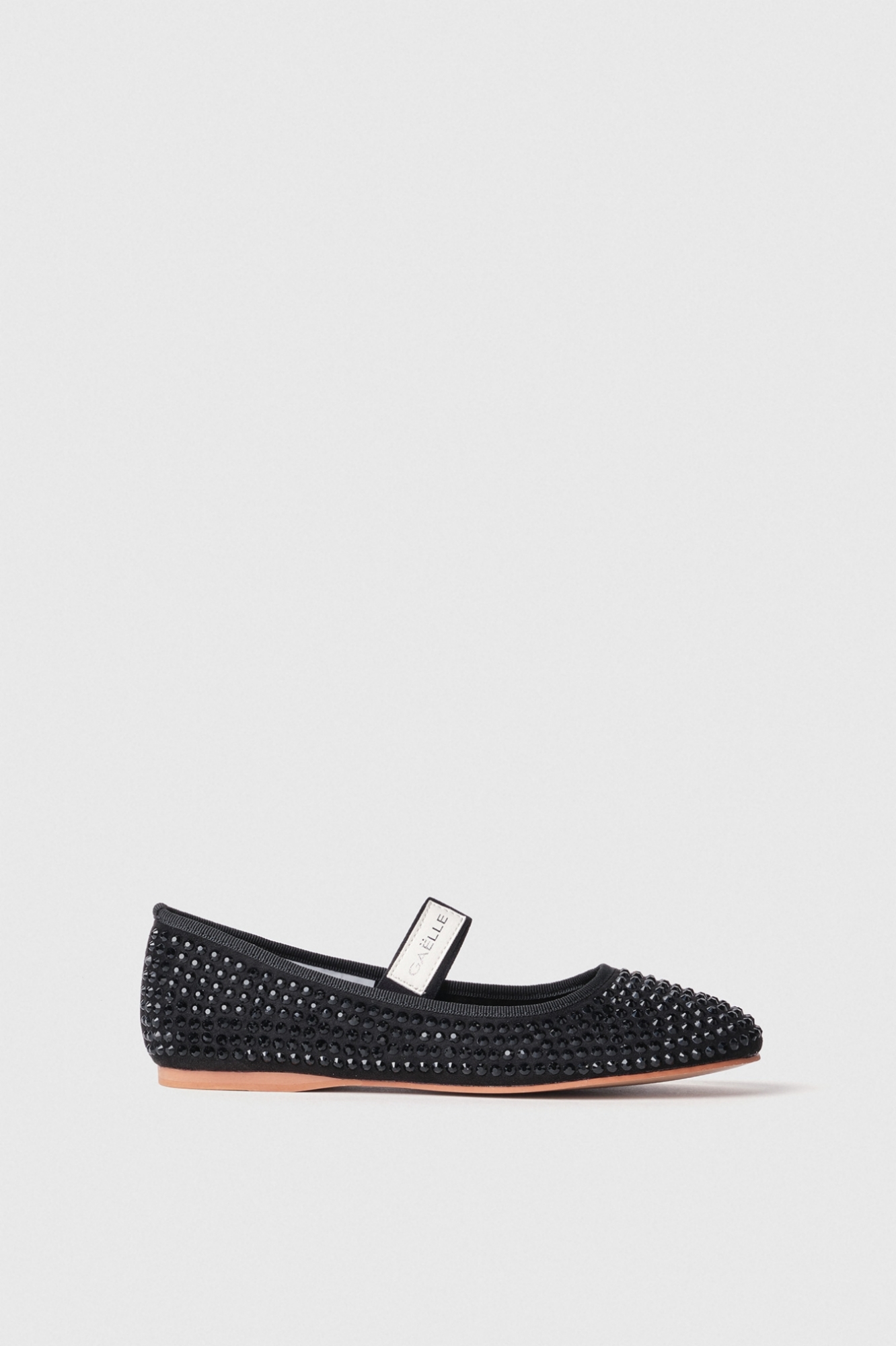 Ballerina flat in suede con strass e etichetta logo su elastico • Nero
