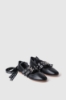 Ballerina flat in ecopelle con allacciatura in gros logato • Nero