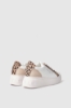 Sneakers addict in action leather con inserti animalier e suola logata • Animalier beige