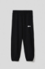 Picture of Fleece trousers with French pockets and print • Black