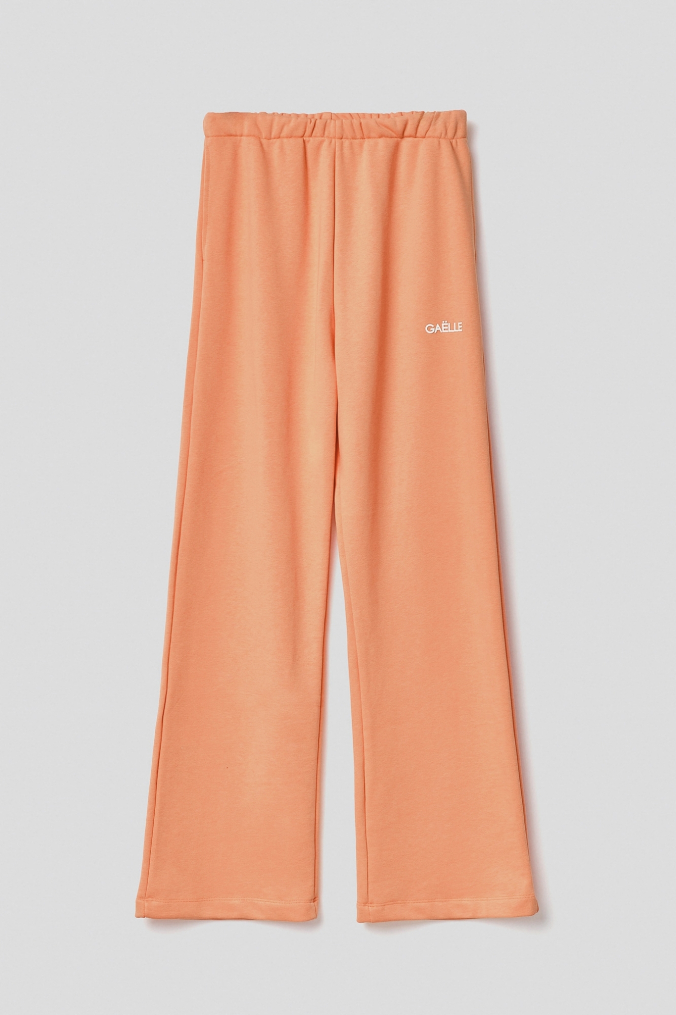 Immagine di Pantalone palazzo in felpa con tasche alla francese e stampa • Arancione melone