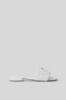 Sandalo in matelasse' con placchetta logo • Bianco