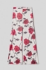 Pantalone a palazzo in raso stampato • Rose rosse