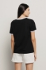 T-shirt paricollo con stampa logo e bottoni logati oro • Nero