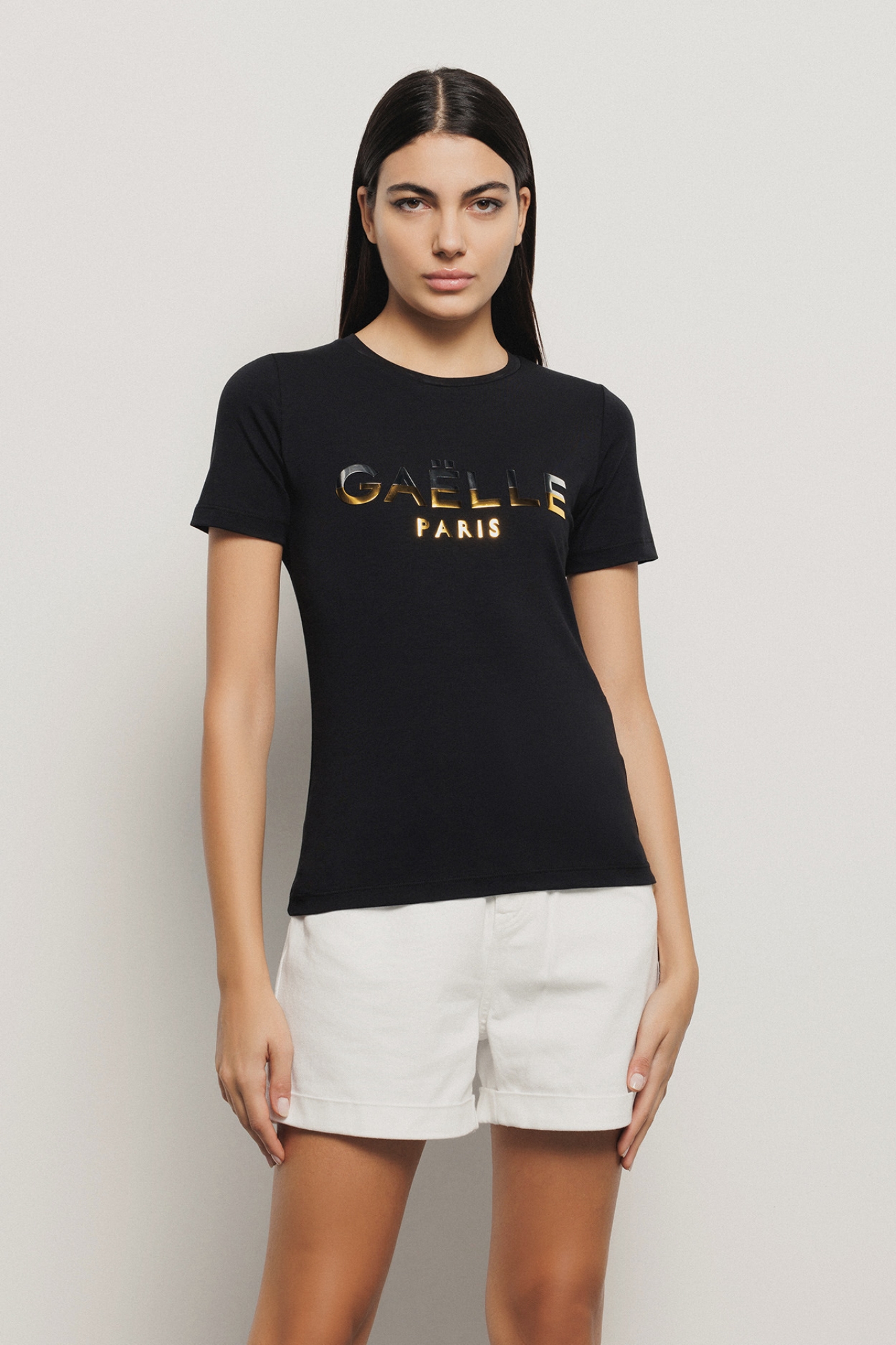 T-shirt paricollo con appl. brick oro/argento • Nero