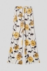 Picture of Printed satin palazzo trousers • Yellow roses