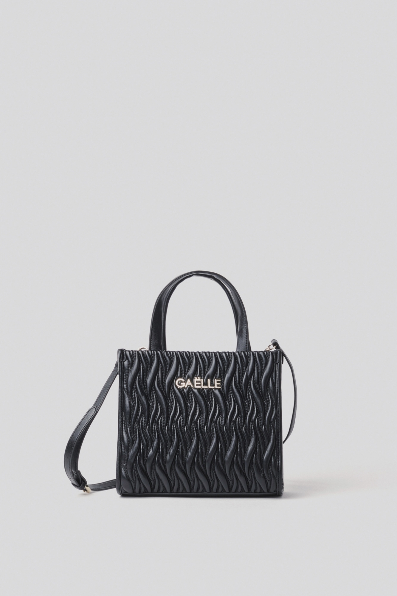 Reg. shopper plisse' con logo in metallo • Nero