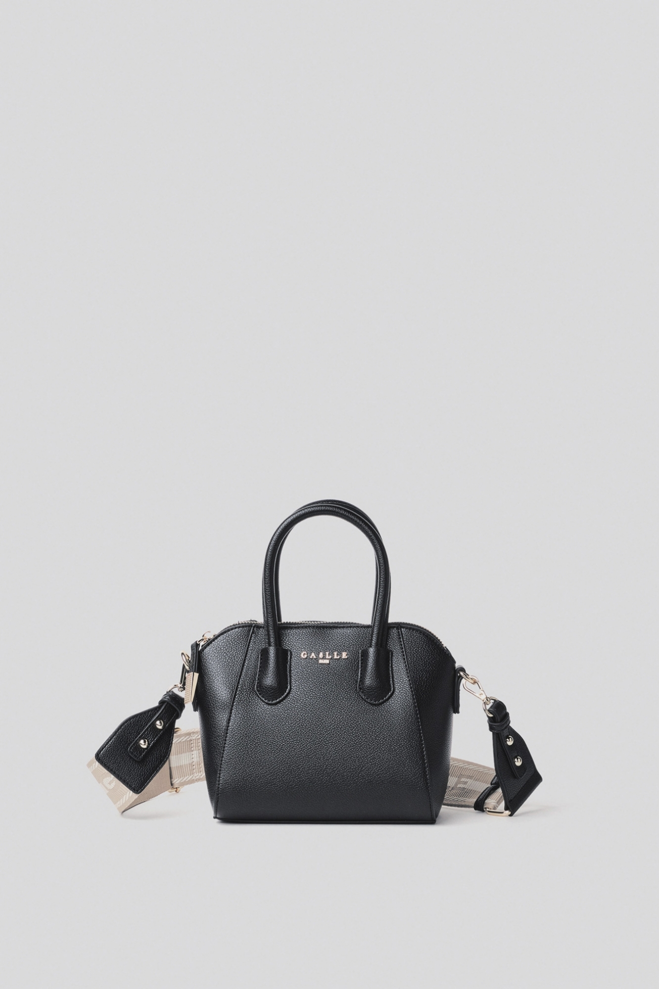 Mini duffle con logo in metallo e tracolla jacquard • Nero