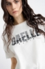 T-Shirt In Jersey Con Applicazione Strass • Off White