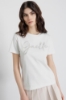 T-Shirt Paricollo Mezza Manica Con Logo Ricamato A Mano E Strass Termo • Off White